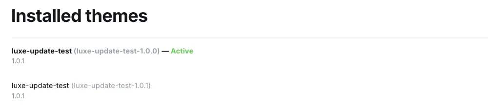 Ghost admin Installed themes list on a Luxe Themes test site showing two entries with the same theme name, luxe-update-test, one marked active with the folder name luxe-update-test-1.0.0 and a second with the folder name luxe-update-test-1.0.1