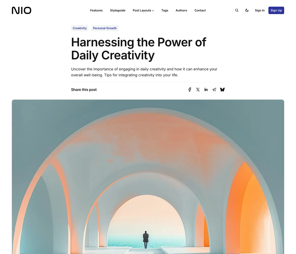 Nio Text First post layout with the tags, title and excerpt above the feature image