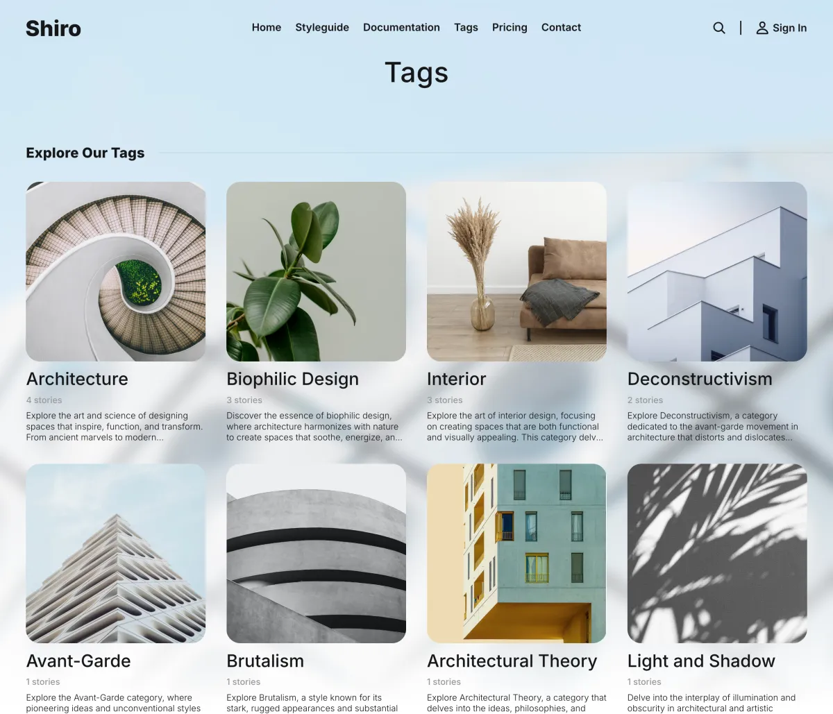 Shiro tags grid page with each tag as an image card with name, post count and description